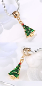 Detailed close-up of green enamel Christmas tree charm with gold plating for bracelets