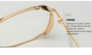 Macro detail of high-quality gold metal sunglasses hinge with secure anti-drop screw design