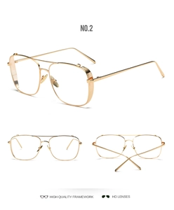 Detail of high quality golden metal aviator frame with double bridge and HD lenses