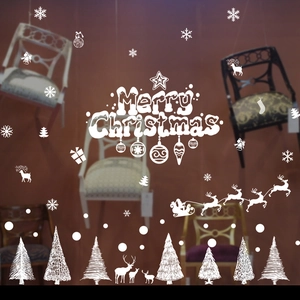Detailed white Christmas window stickers featuring snowflakes, reindeer and Merry Christmas text