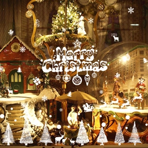 White Merry Christmas window decals with snowflakes reindeer and trees for festive glass decor