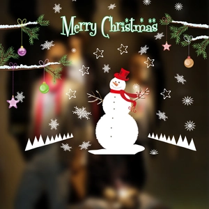 Close-up of a festive Christmas snowman wall sticker with snowflakes and pine branches