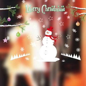 Detail of Christmas window sticker featuring a snowman, snowflakes and Merry Christmas text