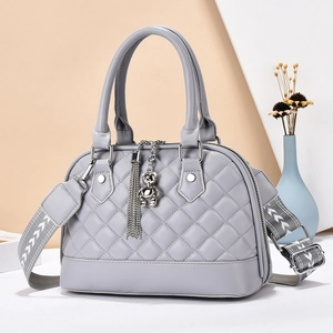 Grey quilted diamond pattern handbag with cute bear pendant and woven shoulder strap