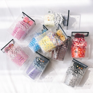 Coral fleece thermal cake socks in various colors and polka dot patterns in gift boxes