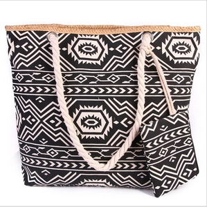 Canvas beach tote bag with black and white geometric ethnic pattern and small coin purse