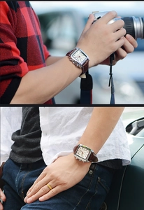 Close-up of a square silver watch with a brown leather strap and three-eye chronograph display