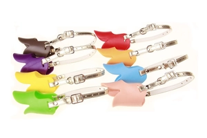 Detailed display of eight colorful silicone duck-bill muzzles with adjustable metal buckles