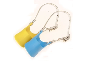 Detail of yellow and blue silicone duck-shaped dog muzzles with adjustable straps