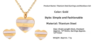 Detailed view of heart shell jewelry set with dimensions and gold titanium steel specs