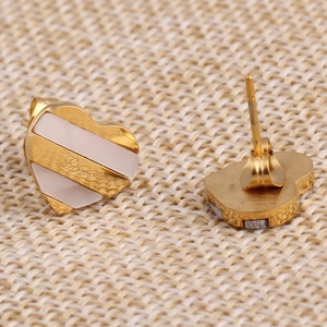Golden heart stud earrings with white inlay and Love engraving for minimalist jewelry set