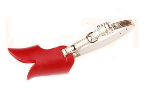 Detail view of red silicone duckbill muzzle with adjustable metal buckle for small dogs