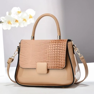 Elegant beige crocodile pattern shoulder bag with glossy finish and top handle