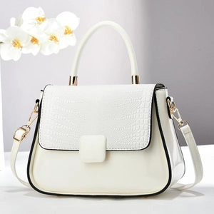 White crocodile embossed leather handbag with gold hardware and removable shoulder strap