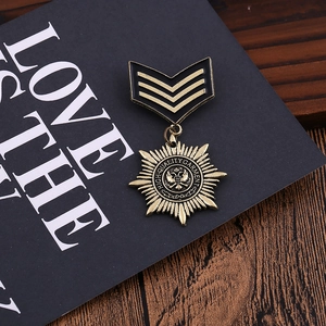 Vintage military style bronze medal brooch with double-headed eagle and black enamel details