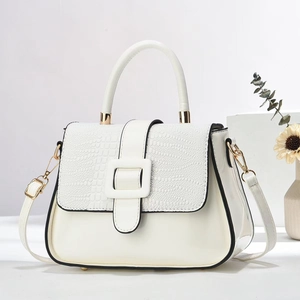 Elegant white faux leather handbag with crocodile pattern texture and gold hardware detail