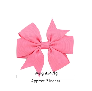 Pink grosgrain ribbon bow hair clip for girls, handmade 3-inch hair accessory on white background