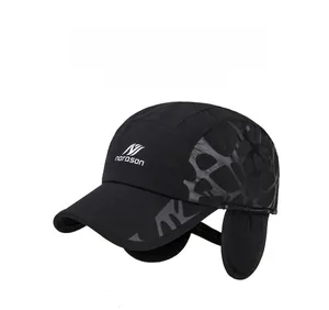 Detailed view of winter baseball cap with ear flaps and gray geometric textures