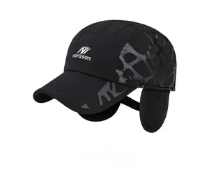 Detailed view of the winter baseball cap featuring windproof fabric and ear protection
