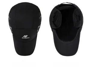 Detail view of black winter baseball cap with ear flaps and thermal inner lining