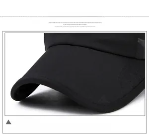 Detailed close-up of the black baseball cap brim with durable stitching and premium fabric
