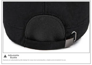Detail of adjustable metal buckle and strap on back of black wool flat top winter hat