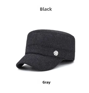 Detail of wool flat top army cap in black featuring a silver star metal logo badge