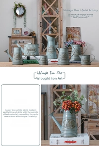 Close-up of vintage blue metal flower pots with embossed text for rustic home decor