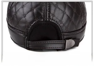 Detail of quilted PU leather baseball cap with adjustable metal buckle and warm lining