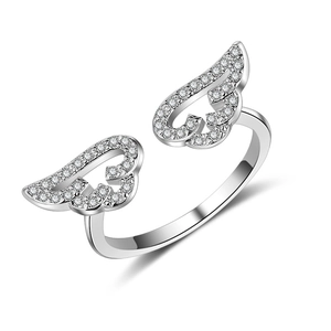 Adjustable silver angel wing ring featuring sparkling pave stones on a white background