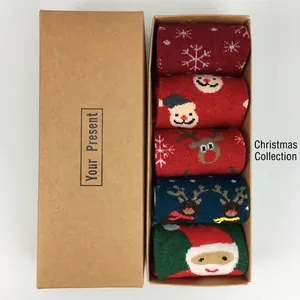 Detailed view of 5-pack Christmas wool socks with reindeer patterns in a gift box