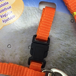 Adjustable bright orange nylon cat harness and leash set with durable plastic buckle
