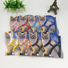 Flat lay of colorful nylon cat harness and leash sets in eight different vibrant colors