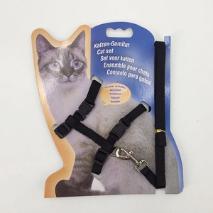 Adjustable black nylon cat harness and leash set with plastic buckles on backing card