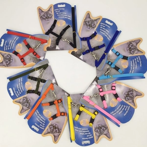 Close-up of colorful cat harness sets in 8 colors with adjustable buckles and metal hooks