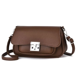 Deep brown lychee texture shoulder bag for women with silver metal buckle and strap