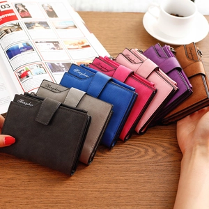Short women's leather wallet with multiple card slots and secure snap closure