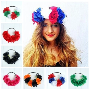 Elastic headband featuring colorful artificial roses in red white and blue floral patterns