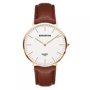 Detailed view of white minimalist dial with rose gold case and brown leather watch strap