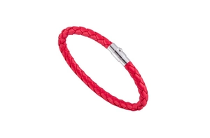 Detail of red braided leather bracelet featuring a silver magnetic clasp on white background