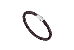 Detail of hand-woven brown leather bracelet featuring a magnetic metal clasp on white back