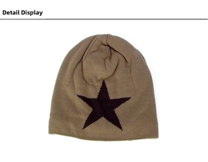 Close-up of khaki knitted beanie featuring a black star pattern and textured finish