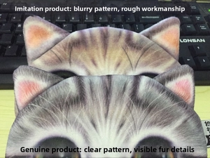 Detail of realistic cat face print with high-quality bionic dyeing on a zip coin purse
