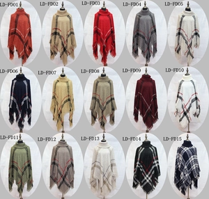 Collage of knit plaid ponchos with high necks and tassels in fifteen diverse color patterns