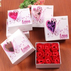 Macro view of 9-piece soap rose gift box with heart-shaped window and floral patterns