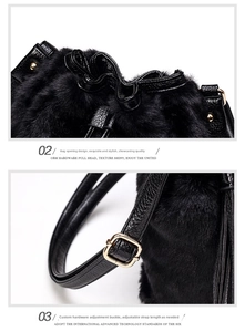 Detail of adjustable gold buckle and black faux fur drawstring bucket bag texture