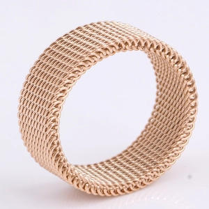 Detailed close-up of 8mm golden mesh woven ring showing intricate metal texture and craftsmanship