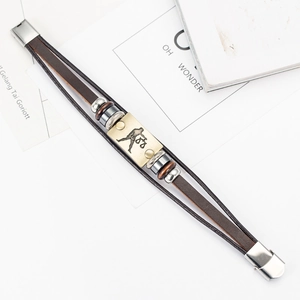 Detail view of multi-layer brown leather bracelet with Libra zodiac sign metal plate