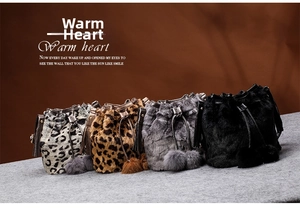 Selection of faux fur bucket bags featuring leopard prints and tassels with drawstrings