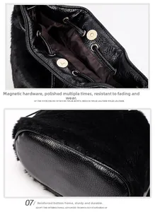 Detail of magnetic snap closure and reinforced base of black faux fur bucket bag